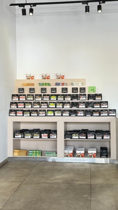 Tall display unit stocked with coffee products
